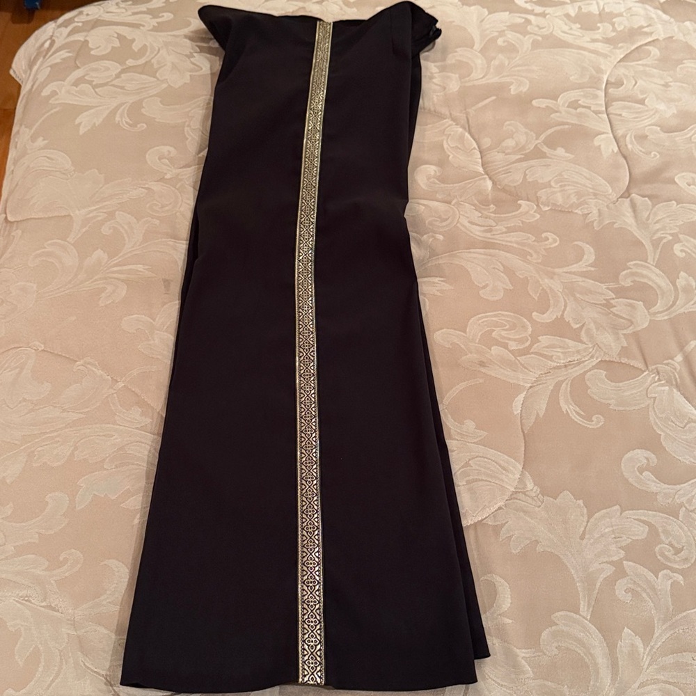 Aura Elegant Black Wide-Leg Pants with full length gold trim on both legs